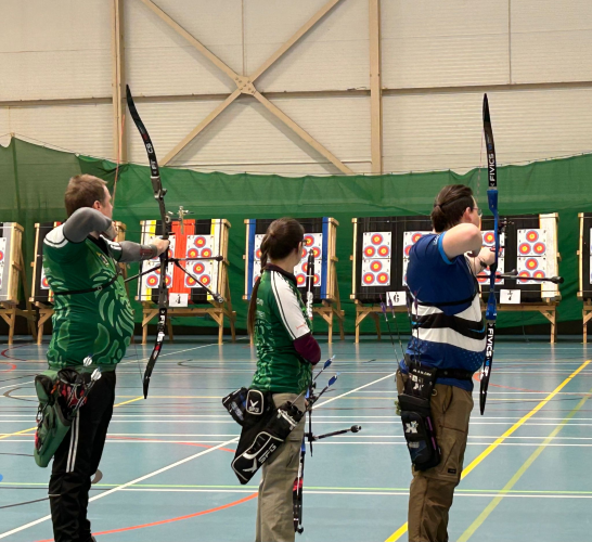 Winnington Park Bowmen members at an indoor archery event